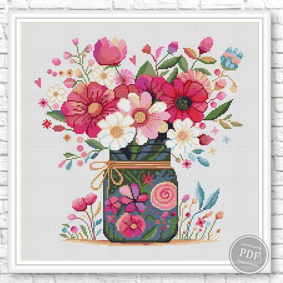 7.00 USDCross stitch patterns flowers. Bouquet of flowers # 2. Modern cross stitch. Beautiful flowers. Instant download PDFThis modern bouquet cross stitch pattern features a beautiful arrangement of pink and white flowers in a decorative vase. Designed for easy stitching, this digital PDF is perfect for floral embroidery lovers, DIY gifts, or handmade spring decor. The chart includes detailed instructions and a colorful chart for confident stitching. Ideal for beginners and experienced crafters alike, this floral cross stitch pattern brings elegance, color, and a handmade charm to any project. Instant download lets you start stitching right away!Please note this is a PDF scheme only.No fabric, floss, or other materials are included in the listing.It is a digital pattern PDF format and will be available to download when the payment will be received. PATTERN INFORMATION:A canvas color suitable for work is white, mint, black, gray. You can buy the canvas on Etsy. To do this, follow the link: https://www.etsy.com/shop/MyVintageNeedleArts?ref=shop-header-name&listing_id=1083051609&from_page=listing To the size of the canvas you need to add 5-7 cm on each side of the work for hemming and framing the work.PATTERN INFORMATION:DMC colors: 24Size of one element: 167х168 stitches 190 х 190 cross stitches with air● Fabric: Aida 14 34.5 x 34.5 Cm 13.6 x 13.6 Inches ● Fabric: Aida 16 30.2 x 30.2 Cm 11.9 x 11.9 Inches ● Fabric: Aida 1826.8 х 26.8 Cm 10.6 x 10.6 InchesFILE PRINT VERSIONprinting on A4 format- version with black and white characters - version with colored blocks and symbols This is a printable version with diagrams divided into sections. Printing on A4 paper is possible;FILE TABLET VERSION- version with black and white characters- version with colored blocks and symbolsThis is a screen-friendly (phone and tablet) version with a solid layout. You can enlarge it for a better view.Compatible with PatternKeeper for phone and tablet.Each PDF file includes:Title page with main image;Thread color chart showing colors, keys, thread length, etc;Scheme.In order to open these files you will need Adobe Reader, which can be downloaded here for free: www.adobe.com/products/reader Downloading instructions can be found here:https://www.etsy.com/help/article/3949?ref=help_search_resultI don't accept returns, exchanges, or cancellations.But please contact me if you have any problems with your order.Dear customers, I would appreciate your feedback. They are very helpful at work.