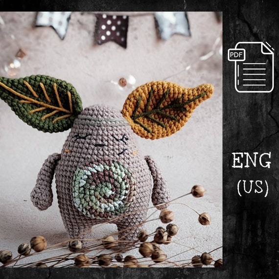 8.59 USDCROCHET PATTERN CUTE MONSTER includes 15 pages of detailed description of crocheting, 54 photos, and a list of materials. Size about 10.5 cm - 4.1 inches without ears. Skill level: medium. The pattern is written in English (US terms). If you have any questions, write to me and I will answer you. ******************** ✔️ Materials needed: 1. Yarnart Jeans yarn 50g/174yds (55% cotton, 45% pac): mustard - number 84, brown-number 71, green (khaki) - number 82 2. Yarnart Jeans Crazy yarn 50g/174yds (55% cotton, 45% pac): number 7203 3. Black threads 25g/163yds, cotton 100% (for smile) 4. 2.0 mm crochet hook (US B) 5. Fiberfill 6. Needle with a large hole for sewing parts, sewing needle You may also like:Valentine dollhttps://www.etsy.com/listing/1395519290/crochet-pattern-doll-valentine-amigurumi?ref=listings_manager_gridMr. Pom Pomhttps://www.etsy.com/listing/1449014609/crochet-pattern-mr-pom-pom-crochet?ref=listings_manager_gridPlease note that this listing is for a digital pattern download only, not a finished physical product. Your files will be available to download immediately after the payment confirmation. For more details, please visit the page https://help.etsy.com/hc/en-us/articles/115013328108Happy crocheting!