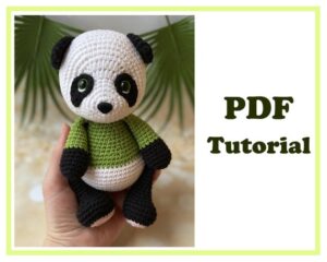 5.60 USDAmigurumi Panda. Pattern Crochet PDF - Instant downloadPDF pattern includes instructions on 11 pages and 32 photos.Pattern is written in English.The height of the toy with tight crocheting: 19 cm, sitting about 15 cm. Materials:- YarnArt Jeans (cotton - 55%, polyacrylic - 45%, 50g/160m): - color 62 white ≈ 20 g - color 53 black ≈ 20 g - color 69 green ≈ 15 g - color 74 pink ≈ 5 g- Hook 2.5 mm.- Eyes 10 mm, on a secure mount.- Nose ≈ 10*15 cm, on a secure mount.- Hollow fiber.- Needle, thread, scissors, marker for stitches. Abbreviations:R – row ch – chain sl st - slip stitch sc – single crochethdc - half double crochet dc- double crochettr – treble crochet inc – increase (2 sc in one stitch) dec – decrease (2 sc together) [...] - number of stitches you should have at the end of the row(…) - repeat whatever is between the brackets the given number of times Level: advanced beginner/intermediate.This listing is for a PDF PATTERN INSTANT DOWNLOAD, not a finished product.