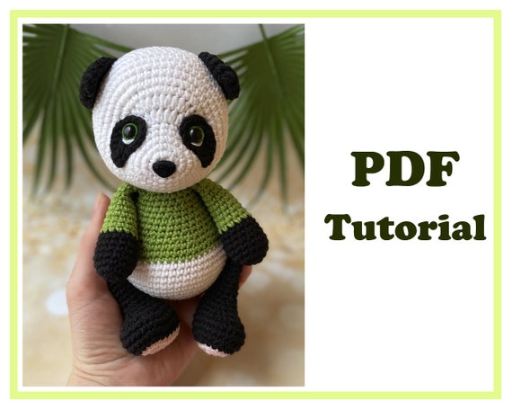 5.60 USDAmigurumi Panda. Pattern Crochet PDF - Instant downloadPDF pattern includes instructions on 11 pages and 32 photos.Pattern is written in English.The height of the toy with tight crocheting: 19 cm, sitting about 15 cm. Materials:- YarnArt Jeans (cotton - 55%, polyacrylic - 45%, 50g/160m): - color 62 white ≈ 20 g - color 53 black ≈ 20 g - color 69 green ≈ 15 g - color 74 pink ≈ 5 g- Hook 2.5 mm.- Eyes 10 mm, on a secure mount.- Nose ≈ 10*15 cm, on a secure mount.- Hollow fiber.- Needle, thread, scissors, marker for stitches. Abbreviations:R – row ch – chain sl st - slip stitch sc – single crochethdc - half double crochet dc- double crochettr – treble crochet inc – increase (2 sc in one stitch) dec – decrease (2 sc together) [...] - number of stitches you should have at the end of the row(…) - repeat whatever is between the brackets the given number of times Level: advanced beginner/intermediate.This listing is for a PDF PATTERN INSTANT DOWNLOAD, not a finished product.