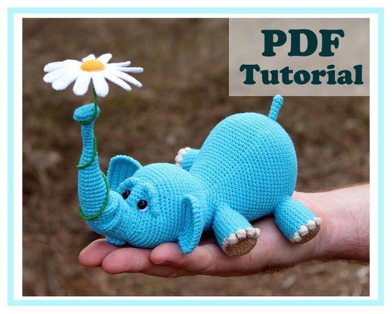 5.60 USDAmigurumi Elephant and balloon. Amigurumi Elephant and flower. Crochet pattern PDF. Tutorial.!!! Language: ONLY ENGLISH !!!Pattern Crochet PDF Tutorial - Instant downloadPDF pattern includes instructions on 17 pages, 28 photos, 16 videos. (The elephant pattern, pattern of the flower and balloon) Dimensions of my elephant: length 22 cm, height 9 cm, trunk height 14 cm.Legs, head and trunk of an elephant do not sew, they are crocheted at once.Pattern is written in English.Level: advanced beginner/intermediate.This listing is for a PDF PATTERN INSTANT DOWNLOAD, not a finished product.Materials:- YarnArt Baby, 150m/50g, 100% acrylic, 1.5 skeins of yarn. (or any other yarn made up of acrylic, acrylic/cotton)- Thin yarn for flower - white, yellow, green (I have Alize Miss)Dimensions of my elephant: length 22 cm, height 9 cm, trunk height 14 cm.If you need a smaller size, then take the yarn thinner. If you need a large size, then take the yarn thicker. - Hook 2 mm (if no other hook is specified on the label)- Eyes 10 mm- Wire (40 cm for trunk and 12 cm for flower stem)- Hollow fiber (or other stuffing material).- Cardboard.- Glue (to glue eyes).- Needle, scissors (to sew the tail)