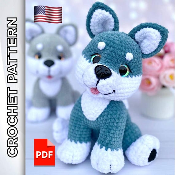10.19 USDThe toy is crocheted as one piece, i.e., the body and head are crocheted together. The paws and muzzle are crocheted in the process of crocheting, and only the tail, ears, and decorative elements are sewn on.The height of the finished toy (using the stated materials) is about 10.6 inches (ca. 27 cm).The crochet pattern in Pdf format includes:- detailed text description of knitting on 59 pages;- more than 150 high-quality photos of the process;- 14 links to videos of difficult moments (you need to click on the text highlighted in pink and you will be automatically redirected to the desired video).The template is only available in English.This pattern does not include the lessons of crocheting. You must have previous knowledge of crochet techniques.Please note: this is not a readymade toy. Materials not included.The required materials:- 4 mm basic crochet hook and 2.5 mm for the tongue and paw pads.- Plush LaVita Yarn Velur (120m/100g). Basic color 6013 (light gray) - 90 g. Additional color 1002 (white) - 65 g.— A little bit of cotton YarnArt Jeans (160 m/50 g) in black and pink for the eyes and muzzle design.— Stuffing material (fiberfill/polyester). — Trapezoid safety eyes with oblique pupil D=20 mm. — Dog safety nose 26×21 mm (can be replaced with 25×19, 22×17 mm). — Scissors, tapestry needle, pins, and stitch marker to indicate the beginning of the round.✅ You can use any yarn and tools, but the final size of the toy may vary.