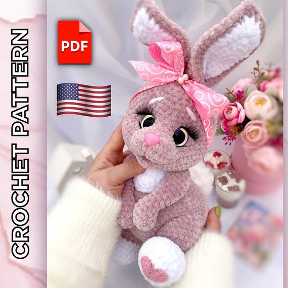 8.99 USDThis cute bunny crochet pattern is perfect for Easter, spring decor, or a heartfelt handmade gift. Designed with beginners in mind, this soft plush rabbit will bring joy to both kids and adults!The toy is crocheted as one piece, i.e., the body and head are crocheted together. The paws and mouth are attached during the crocheting process, and only the ears and decorated elements (heart and belly) are sewn on.The height of the finished toy using the stated materials is 9 inches (ca. 23 cm) without ears and 12.5 inches (ca. 32 cm) with the ears. This pattern does not include the lessons of crocheting. You must have previous knowledge of crochet techniques.The crochet pattern in Pdf format includes:- detailed text description of knitting on 50 pages;- more than 130 high-quality photos of the process;- 10 links to videos of difficult moments (you need to click on the text highlighted in pink and you will be automatically redirected to the desired video).The template is only available in English.Please note: this is not a readymade toy. Materials not included.The required materials:- 4 mm basic crochet hook, 2.5 mm crochet hook for the hearts of the paws. - Plush yarn LaVita Yarn Velur (120m/100g). The basic color - 1,5 skeins. For the gray bunny, I used color 6013 (light gray), and the powder bunny - 4002 (light pink).The additional color 1002 (white) - about 30 g.- Fur yarn 60m/100g Artemida Astra Premium white (for the tail) - about 10 g. You can use a ready-made fur pompom with a diameter of 5-6 cm.- For the eyes decoration and hearts, use a little black and pink YarnArt Jeans (160m/50g).- Firm thread for sculpting. - Stuffing material (fiberfill/polyester). - Trapezoid safety eyes D=20 mm (I use with a slanted pupil), and a safety nose 15 x 13 mm.- Artificial eyelashes, glue (I use Crystal glue). - Scissors, tapestry needle, pins, and stitch marker to indicate the beginning of the round. - Satin ribbon 2.5 cm wide, beads, rhinestones, for decoration (optionally).✅ You can use any yarn and tools, but the final size of the toy may vary.