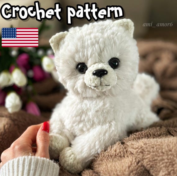 9.50 USDThis PDF crochet pattern consists of: -25 pages of detailed step-by-step instructions for making this toy; -over 35 colorful close-up photos; -8 links to videos with visual explanations (you just need to click on the text highlighted in blue and your browser will redirect you to the video)Here you can find more patterns in a similar style:https://www.etsy.com/shop/ThreadTutorial?ref=seller-platform-mcnav&section_id=39135406PATTERN AVAILABLE IN ENGLISH ONLY.PLEASE NOTE: THIS PURCHASE IS ONLY FOR A DIGITAL CROCHET PATTERN, NOT THE FINISHED TOY ! Instant digital download - ready to download once payment is confirmed.You will see the download link in details of your order.Final size of the toy with the recommended materials and tools 7.9*7.1 in (20*18 cm).You can use your favorite materials and tools, but final size of the toy may differ.Please note that each master has his own style and density of crochet. The size of the finished toy may vary from the size indicated in the template.Crochet pattern in USA conditions.skill level: intermediate. Pattern Crochet pattern does not contain crochet lessons. You must have toy crocheting skills.Recommended materials and tools:1.Fur yarn VYAZ 100g/55m – 2 skeins (basic color) Similar yarn: Yarn Market FANCY; Yarn 21 Natural Mink.2.Plush yarn Himalaya Dolphin baby 100g/120m – a little bit of additional color3.DK weight yarn YarnArt Jeans – pink for the tongue4.3.25 mm crochet hook (basic) and 2.5 mm for the tongue 5.Black safety eyes D=16 mm 6.Safety nose 20*15 mm7.Cotter pins and disks: d.30 mm for the front paws, d.35 mm for the hind paws, and d.40 for the head8.Stuffing material (fiberfill)9.Stitch marker, tapestry needle, and firm thread for sculpting and sewing the parts10. Glue and baked black polymer clay for paw pads (optionally)Pattern Notes:This pattern is my own original design. Copy, distribution, resale, sharing of this pattern or any its parts is STRICTLY FORBIDDEN! This pattern is for personal use only! Please respect my work.You may sell the finished product.This pattern does not contain crochet lessons.I don't accept returns, exchanges, or cancellations. But please contact me if you have any problems with your order.
