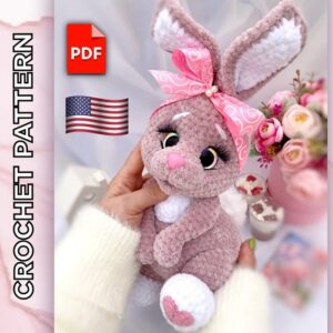 8.99 USDThis cute bunny crochet pattern is perfect for Easter, spring decor, or a heartfelt handmade gift. Designed with beginners in mind, this soft plush rabbit will bring joy to both kids and adults!The toy is crocheted as one piece, i.e., the body and head are crocheted together. The paws and mouth are attached during the crocheting process, and only the ears and decorated elements (heart and belly) are sewn on.The height of the finished toy using the stated materials is 9 inches (ca. 23 cm) without ears and 12.5 inches (ca. 32 cm) with the ears. This pattern does not include the lessons of crocheting. You must have previous knowledge of crochet techniques.The crochet pattern in Pdf format includes:- detailed text description of knitting on 50 pages;- more than 130 high-quality photos of the process;- 10 links to videos of difficult moments (you need to click on the text highlighted in pink and you will be automatically redirected to the desired video).The template is only available in English.Please note: this is not a readymade toy. Materials not included.The required materials:- 4 mm basic crochet hook, 2.5 mm crochet hook for the hearts of the paws. - Plush yarn LaVita Yarn Velur (120m/100g). The basic color - 1,5 skeins. For the gray bunny, I used color 6013 (light gray), and the powder bunny - 4002 (light pink).The additional color 1002 (white) - about 30 g.- Fur yarn 60m/100g Artemida Astra Premium white (for the tail) - about 10 g. You can use a ready-made fur pompom with a diameter of 5-6 cm.- For the eyes decoration and hearts, use a little black and pink YarnArt Jeans (160m/50g).- Firm thread for sculpting. - Stuffing material (fiberfill/polyester). - Trapezoid safety eyes D=20 mm (I use with a slanted pupil), and a safety nose 15 x 13 mm.- Artificial eyelashes, glue (I use Crystal glue). - Scissors, tapestry needle, pins, and stitch marker to indicate the beginning of the round. - Satin ribbon 2.5 cm wide, beads, rhinestones, for decoration (optionally).✅ You can use any yarn and tools, but the final size of the toy may vary.
