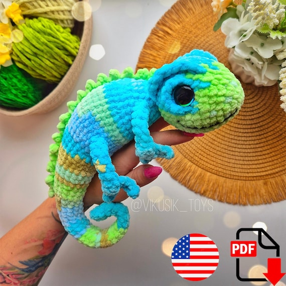 10.97 USDIn this lesson, you will learn how to crochet a bright chameleon with charming eyes.The finished size of the toy, using a 3.75 mm crochet hook and the stated materials is ~9 inches / 23 cm in height.This pattern tutorial includes one PDF file with 14 pages of detailed descriptions of how to crochet your toy with simple step-by-step instructions (language: English) and plenty of photos.Please note: This is not a finished toy. Materials are not included. Materials:3.75-4 mm crochet hook for plush yarn.Plush yarn 120m/100g– (I crocheted Lavita Velur, you can use an analog: Himalaya Dolphin Baby, YarnArt Dolce, Wolans Bunny Baby, Panda Baby Bonbon, and others). Yarn consumption is about 70 g.The basic color is 2 pcs, and the additional color is 1 or more colors. Safety eyes D-18 mm (20 mm).Tapestry needle (long and short).Pins.Scissors.Stitch markers.Stuffing material.Wire for the wireframe D=1.5-2 mm. It is best to use copper (I have 40 cm/15.7 inches long for floristry - 1 piece).Adhesive tape for securing the wireframe.Cutters, pliers. Abbreviations (US):MR – magic ringsc – single crochetinc – increase – two single crochet in one stitchdec – decrease – two single crochet togetherch – chainsl st – slip stitch(…) inc – repeat increases are instructed(….) х 6 times – repeat 6 times or as instructed This is a paid pattern!This pattern is protected by copyright, and it is intended only for personal use. This pattern is a work of authorship of Victoria Kravchenko. It is forbidden: change the pattern in whole or partly, use the instructions for your patterns or video tutorials, full or partial reproduction and distribution, exchange or send this pattern to third parties. It is forbidden to publish this pattern in a whole or partly on the internet, on public social networks, or private pages.Feel free to contact me if you have any questions.