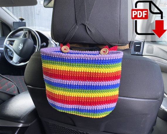 4.00 USDCrochet car trash bag pattern.Create your own crochet car trash Bag with this easy crochet pattern.ATTENTION: This is a PDF crochet pattern! Not a ready-made car trash bin. Materials not included.Cute mini trash bag for your car! Perfect for those pesky receipts and straw trash! Attaches easily to your passenger side or driver side headrest. Simply run the button strand around the metal bracket, button it back into the can, and you're done!It's perfect to holder things that you need to have close while you go in your car (water bottles, hands sanitizers, gloves and scarves, napkins, cellphone)There are NO REFUNDS after purchase since this is a DIGITAL DOWNLOAD. This template crochet pattern is delivered via digital instant download.When your payment is completed, you will receive an email from Etsy with a download link.This very simple amigurumi pattern includes step-by-step photos to help you along the way.Language: EnglishMeasurements:7" wide x 2.7" deep x 5.1" tallRecommended materials and toolsAran/Worsted/10ply yarn YarnArt JEANS PLUS (160m/100g) of green, red, orange, yellow, blue and purple colorsSewing needle Hooks size 4 mm 2 wooden buttons size 20 mmAbbreviations:ch – chain sc – single crochet inc – crochet 2 sc in one stitcht-ch – turning chain(….) * n – repeat instruction in brackets N times (…) – number of loops in a row / round