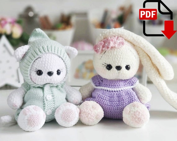 8.56 USDCrochet pattern set for creating a plush kitten in a hooded romper and a soft bunny in a pastel dress. This digital PDF tutorial includes instructions for both amigurumi animals and works well for nursery decor, baby shower gifts, or handmade toy collections. The finished plush toys feature a soft kawaii-inspired style with floppy ears, oversized heads, and cozy pastel outfits. Suitable for crocheters interested in cute animal amigurumi and decorative plush projects.All photos show real handmade toys created from this pattern. This pattern is written by a human, not generated by AI. Please note: this is not a readymade toy. Materials not included.Language: English.Recommended materials and tools:•Yarn Softy Plus by Alize or Dolphin Baby by HiMALAYA, gauge: 120m/100gr. For a toy you need ~ one yarn ball and a half or 2 yarn balls.•Crochet hook size 2,75mm or 3mm.•Some semi-cotton yarn pink color to crochet pads, for example: Jeans by YarnArt or Cotton Gold by Alize.•Crochet hook size 1,75mm.•Strong cotton threads matching color to sew the parts.•Black threads to embroider.•Toy eyes d.15mm.•Toy nose size 15x13mm.•Toy stuffing.•Long sewing needle to sew the parts and to make sculpting.•Scissors.•Stitch marker. To crochet the onesies you will need:•Yarn Cotton Baby by Alize.•1 button.•Crochet hook size 2-2,5mm.•Sewing needle and sewing threads matching color to sew buttons. To knit the onesies you will need:•Yarn Cotton Baby by Alize.•Knitting needles size 2,5mm.•4 buttons.• Sewing needle and sewing threads matching color to sew buttons.