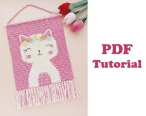 6.20 USDWall Hanging Decor Pattern, Crochet Cat Wall Decor Pattern, Nursery Wall Decor small, Crochet Kitty PatternCreate your own crochet wall hanging decor with this crochet pattern! This easy-to-follow pattern includes one PDF file with detailed instructions. It will be wonderful wall decor for your home or as a baby shower gift.Only basic crocheting skills will be needed: chain, single crochet, slip stitch, double crochet, increasing, decreasing.This pattern is in English language.Please note that this is a crochet pattern (PDF file), not the toy. The file will be available for download immediately after purchase. MATERIALS:Alize Cotton Gold Plus – (pink), (white)Yarn Art Jeans – (yellow)Yarn Art Jeans – (blue)Yarn Art Jeans – (pink)Yarn Art Jeans – (leaves)Yarn Art “Iris” - (for eyes and nose)Sewing thread – black (for whiskers)Hook - 3mmWooden or plastic stick — 30 cmSize: (approx.)W28 cm X L58 cmPlease do not copy or redistribute this pattern or claim it as your own. You may sell your finished items if you like. Thanks!