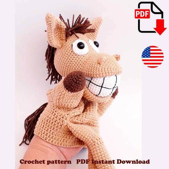 4.39 USDCrochet pattern for making a horse hand puppet with a large cartoon-style smile, soft mane, and long movable legs. This digital PDF tutorial helps you create a playful farm animal puppet suitable for kids’ pretend play, puppet theater, classroom activities, or handmade gifts for children. The expressive design works especially well for storytelling games, nursery toy collections, and humorous animal-themed decor.This pattern is easy to follow and packed with helpful photos, making it a great project for anyone with basic crochet skills. The finished toy is about 30 cm tall (including the legs), lightweight, and comfortable to use as a puppet.All photos show real handmade toys created from this pattern. This crochet pattern is written by a human, not generated by AI.What’s Included:• PDF pattern - 21 pages• Clear instructions + detailed step-by-step photos• Language: English.• Instant digital downloadSkill Level:Intermediate.This pattern does not include basic crochet lessons. You should be familiar with standard stitches and working in the round.Materials Needed: • YarnArt Jeans (160 m / 50 g) or similar DK yarn, in three colors:— beige (main color) — about 1 skein— brown — less than 0.5 skein— white — less than 0.5 skein• Polyester filling (holofiber or syntepuh)• Half-bead safety eyes• Crochet hook 2 mm• Needle for sewing pieces togetherFinished Size:Approx. 30 cm / 11.8 inches including legs.Please Note:• This is a digital PDF pattern, not a physical toy.• Due to the nature of digital downloads, refunds are not available.• You are welcome to sell finished toys made from this pattern, but please credit the designer.