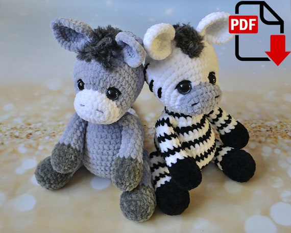 7.29 USDThis PDF crochet pattern consists of:-11 pages of detailed step-by-step instructions for making this toy;- over 24 colorful close-up photos; PATTERN AVAILABLE IN ENGLISH ONLY. PLEASE NOTE: THIS PURCHASE IS ONLY FOR A DIGITAL CROCHET PATTERN, NOT THE FINISHED TOY. MATERIALS NOT INCLUDED. Instant digital download - ready to download once payment is confirmed.You will see the download link in details of your order. Two PDF patterns. The size of the toy, in a sitting position is 7.9 in (20 cm) (not counting the ears)The size of the toy, in a standing position is 11 in (28 cm) (not counting the ears) Materials:- Yarn Himalaya Dolphin Baby or YarnArt Dolce or analogs. - 4 mm hook.- Eyes 18 mm, on a secure mount. - Hollow fiber or other filler.- Two buttons, approximately 18-20 mm in diameter, to secure the legs.- Scissors, stitch markers.