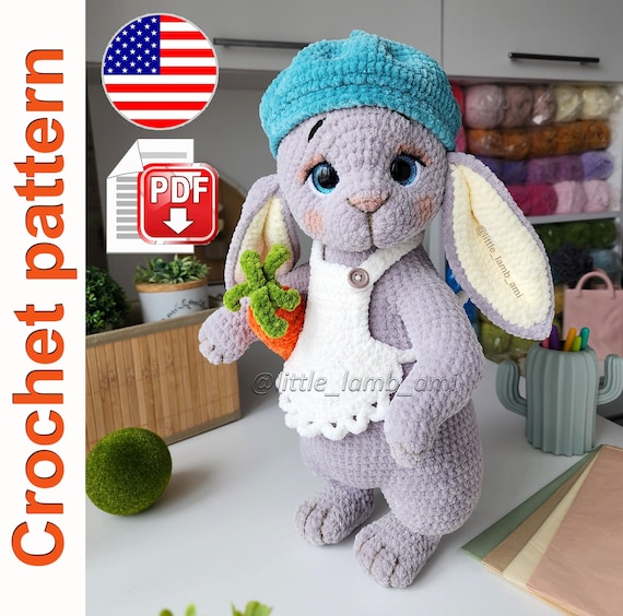 11.95 USDCrochet your own adorable bunny with this detailed amigurumi pattern — a soft plush rabbit with long floppy ears, sparkling eyes, and a cute carrot accessory. The head is attached with a cotter pin joint for natural movement, while the body, arms, and legs are crocheted firmly to keep the toy durable and cuddly.This PDF pattern comes with step-by-step instructions, process photos, and video support to guide you through each stage. The finished bunny stands about 14.5–15 inches (37–38 cm) tall when made with the recommended plush yarn.🧶 Yarn & texture:The bunny is made with Himalaya Dolphin Baby or similar plush yarn for an extra soft touch. Additional colors are used for the apron, carrot, and small details.📝 The PDF pattern includes:• Clear written instructions in US crochet terms• High-quality step-by-step photos• Abbreviations list for stitches• Video tutorials via QR codes for complex parts📌 Skill level: Intermediate — suitable for crocheters with basic amigurumi experience.⚠️ Please note: This is a digital PDF crochet pattern, not a finished toy. Materials are not included. Pattern available in English only.🧵 Materials and tools used:• Yarn: Himalaya Dolphin Baby (main body, muzzle, carrot, apron), YarnArt Jeans (black for details)• Crochet hook 3.5 mm (E/9)• Safety eyes 20 mm, tapestry needle, stuffing material (hollowfiber balls)• Cotter pin 3.2×32 mm with two 50 mm disks (for the head)• Floral wire (0.9–1 mm), dry pastel + brush for toning, adhesive tape• Scissors, stitch marker, optional cardboard for shaping✅ You may substitute yarn or tools with similar ones — final size and texture may vary slightly.