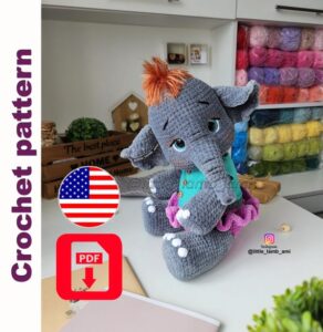 11.95 USDCrochet your own soft and expressive baby elephant with this detailed amigurumi pattern — a plush toy full of personality, featuring big eyes and a gentle face. The goatling's head is attached with a cotter pin joint for natural movement.This PDF pattern includes both photo and video tutorials to guide you through every step of the process, making it ideal for confident beginners and experienced crocheters alike. The finished toy stands approximately 15.8 inches (40 cm) tall with horns when made with the recommended materials.🧶 The toy is made using plush yarn and safety eyes.The legs and arms are crocheted directly into the body, giving the elephant a stable, cuddly structure.📝 The PDF pattern includes:Step-by-step written instructionsHigh-quality photos for each stageQR-coded video tutorials for more complex partsPlease note: this is not a beginner-level crochet course. You’ll need basic amigurumi and crochet skills to complete the toy.📌 The pattern is available in English only.This is a digital product (PDF) — not a finished toy. Materials are not included.🧵 Materials and tools used:- As the main yarn use Himalaya Dolphin baby, color #80369 (grey), needed 2 skeins. You can choose anyother color you like. Also use color #80356 for the skirt, and color #80301 white for the nails and the whites.;- Yarn Lanosa Single, color #922 for the hair;- Yarn YarnArt Jeans, color #53 black for the arrows andthe eyebrows;- Yarn Gazzal baby cotton, color #3426 for the shirt;- A crochet hook E / 9 / 3,5 mm for the plush yarn and C /12 / 2,5 mm for the hair;- Circular knitting needles 0 / 14 / 2 mm;- A tapestry needle for sewing the details together andsculpting;- Sparkling trapezoidal safety eyes 20 mm;- A marker or a thread of a contrast color;- Stuffing material, I use hollowfiber balls;- Scissors;- A cotter pin 3,2R32 mm, and 2 discs dia = 50 mm for thehead attachment;- Dry pastel and a synthetic brush for toning;- 3 buttons dia = 8-9 mm.For the elephant made of Himalaya dolphin fine you needeyes dia = 18 mm, 2 discs dia = 45 mm for the headattachment. Also, you will need only 1 skein of yarn for thetoy.✅ You may use alternative yarns or tools — the finished size and look may vary.