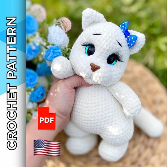 9.25 USDCrochet your own adorable plush cat with this detailed amigurumi pattern. This PDF tutorial includes step-by-step instructions and clear photos, making it perfect for beginners and intermediate crocheters. The finished kitten has big expressive eyes, a soft body, and a charming bow detail — ideal as a handmade gift or nursery decoration. Create a cute and cuddly toy that will bring joy to kids and adults alike.The toy is crocheted as one piece, i.e., the body and head are crocheted together. All paws and tail are attached during the crocheting process, and only the ears are sewn on.The height of the finished toy using the stated materials is about 26-29 cm/10.2-11.4 inches.The crochet pattern in Pdf format includes:- detailed text description of knitting on 39 pages;- more than 90 high-quality photos of the process;- 5 links to videos of difficult moments (you need to click on the text highlighted in pink and you will be automatically redirected to the desired video).The template is only available in English.This pattern does not include the lessons of crocheting. You must have previous knowledge of crochet techniques.Please note: this is not a readymade toy. Materials not included.The required materials:•4 mm crochet hook. •Plush yarn LaVita Yarn Velur (120m/100g), color 1011 (milk) - 1,5 skeins.•A little bit of black YarnArt Jeans yarn (160m/50) for the eyes and eyebrows. •Firm thread for sculpting. •Stuffing materials (fiberfill/polyester). •Trapezoid safety eyes D=20 mm (I use with a narrow pupil), and a safety cat nose 17 x 12 mm.•Artificial eyelashes, glue (I use Crystal glue).•Scissors, tapestry needle, pins, and stitch marker to indicate the beginning of the round.✅ You can use any yarn and tools, but the final size of the toy may vary.