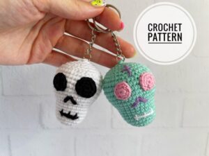 2.30 USDCrochet pattern for a small skull keychain, provided as a digital PDF with step-by-step instructions. The pattern lets you make a cute amigurumi skull that can be customized with different yarn colors and facial details. The finished skull works as a Halloween keychain, backpack charm, bag accessory, or small handmade gift for fans of spooky and gothic decor.All photos show real handmade toys created from this pattern. This pattern is written by a human, not generated by AI.The size of the keychain is about 6 cm (2.36 inches); PLEASE NOTE THAT THIS IS A CROCHET PATTERN, NOT THE FINISHED PRODUCT.************************************Language: English.This crochet pattern is easy to follow with step-by-step instructions, photos illustrating the process).It does not contain crochet lessons. You should have basic crochet skills to be able to crochet with the help of this crochet pattern.*****************************************This crochet pattern is available for Instant Download. When your payment is completed you will receive an email with all the information needed to download your file. This email will be sent to the email address connected with your Etsy Account. If you have any problem, please contact me.*********************************You will need Adobe Reader to open this Pattern.Materials and tools for the keychainSport weight/4ply yarn YarnArt JEANS or Alize Cotton Gold of white or turquoise colors and some black, pink and purple colorsSewing needle Hook size 2.25 mm by CloverStuffing toys materialKeychain fastener*********************************Abbreviations: MR – magic ring sc – single crochet inc – increase dec – decreasesl st – slip stitch(….) * n – repeat instruction in brackets N times (…) – number of stitches in a rowIf you want to be aware of new products, add my store to your favorites!Thank you for your visit!