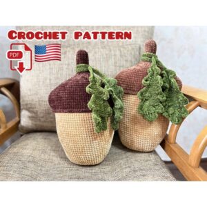 5.00 USDCrochet pattern for making an oversized plush acorn pillow with a textured brown cap and cascading green oak leaves. This intermediate-level project creates a soft woodland-inspired accent that works beautifully as fall home decor, a decorative couch pillow, or cozy cottage and forest-themed room decor. The large finished acorn also makes a distinctive handmade piece for seasonal autumn decorating.PLEASE NOTE:- This is a DIGITAL DOWNLOAD in PDF format, not a finished crochet item. - No physical product will be shipped.- The pattern is written in American English (US crochet terms).- This crochet pattern is 100% human-made and was not generated by AI.- All photos show real handmade items created using this pattern.WHAT’S INCLUDED:This 5-page PDF crochet pattern includes:• detailed step-by-step instructions for crocheting the acorn pillow;• instructions for the acorn body, cap, stem, and decorative oak leaves.SKILL LEVEL:Beginner.Basic crochet skills are required. This pattern does not include crochet lessons.FINISHED SIZE:The finished acorn pillow is approximately:• 13.3 inches (34 cm) tall;• 8.6 inches (22 cm) wide.The final size may vary depending on your yarn, hook size, and crochet tension.MATERIALS AND TOOLS:• Super Bulky / Super Chunky / 14-ply chenille yarn, 120 m / 100 g:– approximately 900 g beige;– approximately 70 g brown;– approximately 20 g green;• 3.5 mm crochet hook (3.75 mm Clover hook was used for the sample);• sewing needle;• toy stuffing.The acorn is crocheted in continuous spiral rounds.